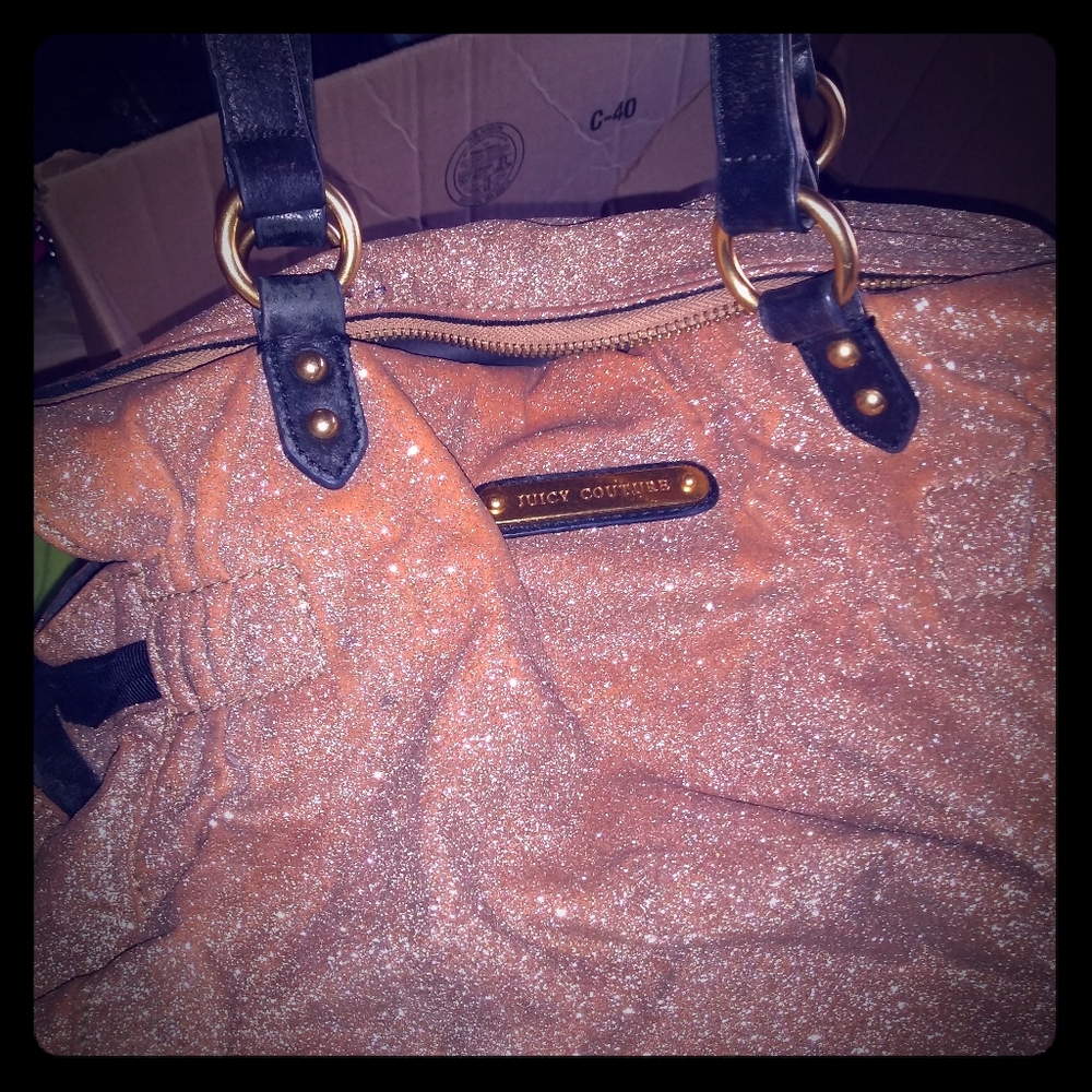 Juicy couture gold sparkly tote with black bows on